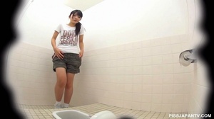 Spy camera in toilet catches babes taking a piss and shows their hairy wet cunt - Picture 10