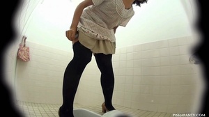 Young hairy tight Asian pussies caught spraying piss by hidden camera in toilet - Picture 1