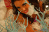 Naughty chick licks her giant lollypop then slowly peels off her purple