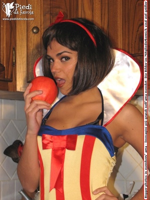 Brunette in pink costume with stockings pose lovely on a kitchen working table. - XXXonXXX - Pic 1