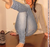 Cute chick in tight blue jeans drops shoes to display sweet cute feet