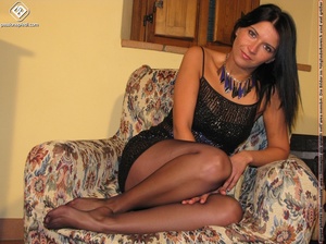 Pretty babe in hot black sexy dress shows off tasty long legs and hot feet on sofa - XXXonXXX - Pic 8