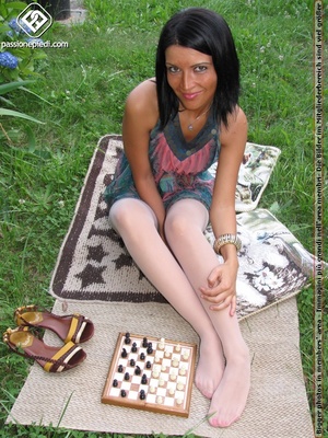 Charming black hair chick shows off sexy legs and feet in white pantyhose outdoors - XXXonXXX - Pic 6