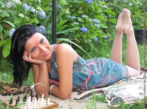 Charming black hair chick shows off sexy legs and feet in white pantyhose outdoors - XXXonXXX - Pic 9