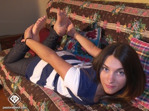 Blue sneaker babe struts her bare feet on the couch. - XXXonXXX - Pic 6