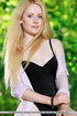 Delightful skank in a black teddy gets naked on the patio.