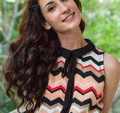 First-rate brunette woman in flowery panties shows off her pretty pussy