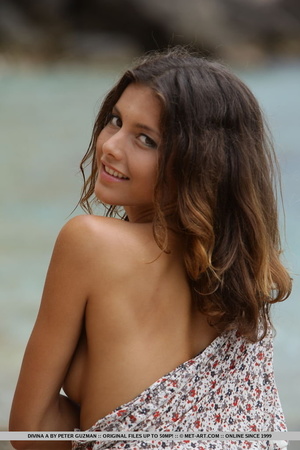 Cutie in a flowery dress gets naked on the beach. - XXXonXXX - Pic 10