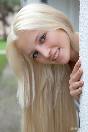 Sweet slim blonde in white dress display - Picture 11
