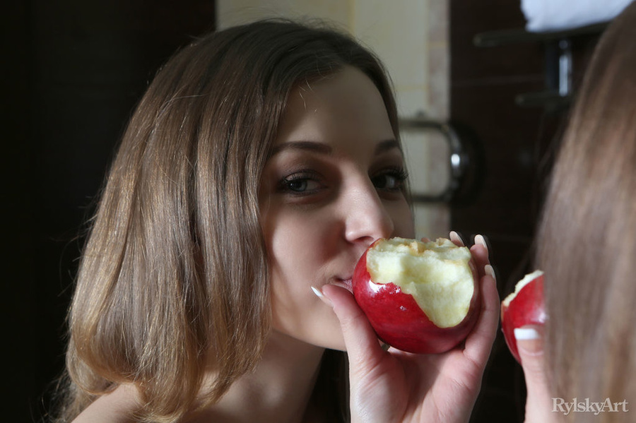 Cute blonde in black pantyhose eats apple a - XXX Dessert - Picture 16