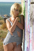 blonde cutie takes off
