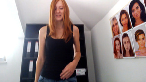 Ginger teen in a black top and jeans ski - Picture 6