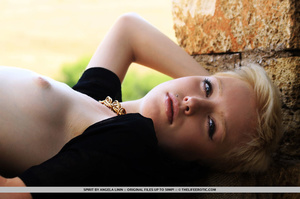 Young sexy short hair blonde in black mo - XXX Dessert - Picture 9