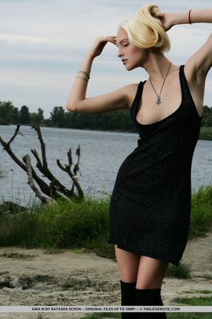 Slim pretty blonde in black dress models - Picture 5
