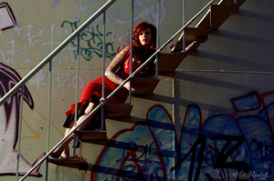 Hot tattooed redhead in red shows tasty tits and shaved pussy on steel staircase - XXXonXXX - Pic 5
