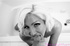 Welcoming harlot sits on a dildo in this black and white photo set.