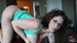 Delish gentlewoman in green lingerie and glasses teases on a chair.