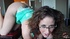Delish gentlewoman in green lingerie and glasses teases on a chair.