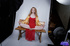 Fantastic doe in a red dress gets naked on a wooden bench.