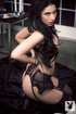 Raven-haired cutie ditches her black lingerie in the living room.