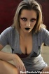Beautiful girl in colorful makeup with hot tits takes off top and sexy
