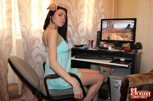 Good girl at computer in blue top and kitty panties rewards hard-on with her sexual talents. - Picture 1