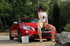 Sex kitten in white tank and nude pantyhose gets herself wet while washing