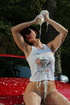 Sex kitten in white tank and nude pantyhose gets herself wet while washing
