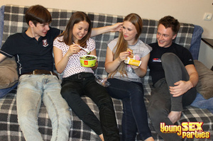Girls enjoy fast food on a plaid couch before getting naked for their boyfriends who are looking to screw. - Picture 3