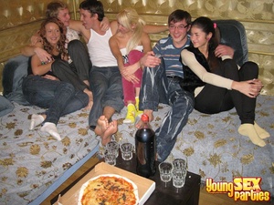 Six sexy youngsters with slammin’ bodies share pizza before they are driven wild by lust in hot orgy. - Picture 1