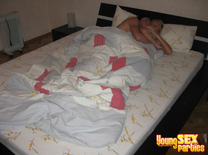 A couple sleeping naked in their bed wake to find a randy couple ready to tangle in the sheets. - XXXonXXX - Pic 2