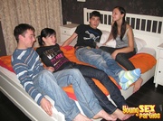 Four attractive teens in jeans shed their pants and engage in fantastically sexy foursome.