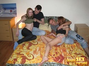 Sinfully sexy foursome on a small pull-out sofa work their way to orgasm in multiple sex angles.
