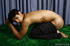 Young man with dark features shows off his rock hard body when pulling
