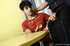 Police officer cuffs handsome teen and reads him his rights before making