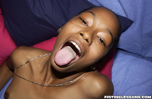 Ebony cheerleader gets nasty with her fair-skinned friend with fisting action. - Picture 8