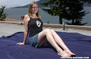 Mischievous minx poses provocatively on a rooftop then takes it inside to finger her ass. - XXXonXXX - Pic 2