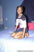 Ebony in a blue bed gets her holes stuffed by her fetching fair-skinned