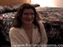 Brunette MILF moistens her guy’s fist with her mouth before he stuffs