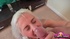 Blonde chick in a grey vest is happy to get a good load of cum onto her