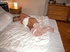 Wholesome lass in white lingerie and stockings is hogtied on her sizable