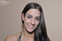 Pink panties are pulled down on a tenderhearted brunette who is bent and