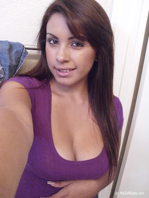 Big-breasted brunette pulls up purple top in a series of scintillating selfies. - XXXonXXX - Pic 1
