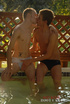 Young gay couple make out and takes off their white supporter and black