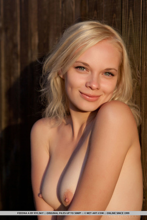 Blondie with a sweet smile slides out of - Picture 18