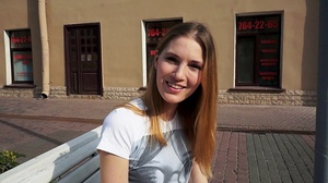 Beautiful teens walking on the sidewalk in different places of Russia wearing sweaters while others in sexy shirts. - Picture 4