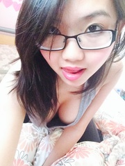 This Asian teeny in glasses loves demonstrate her body in sexy poses