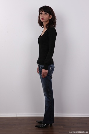 Skinny brunette in black blouse, blue je - Picture 3