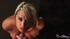 blonde bombshell sits naked