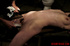 Slim broad in the nude gets the hot and cold treatment from her interrogators.